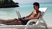 Hairy-Business-Man-with-Laptop-at-Beach