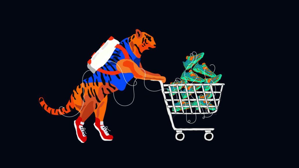 Tiger with backpack pushing a shopping cart full of sneakers.