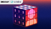 Animated Rubik’s cube showing dollar signs and a user icon, symbolizing audience data monetization and identity solutions in digital publishing.