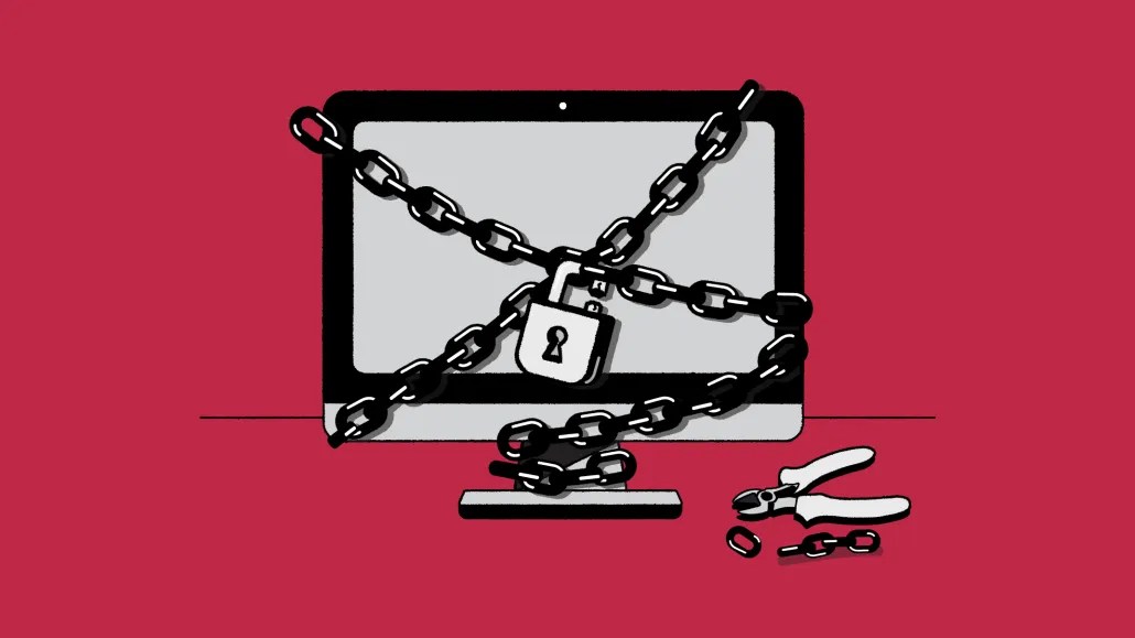 A computer wrapped in chains with a lock, symbolizing the threat of malware and the need for security in digital advertising, highlighting the importance of protecting consumers and brand safety.