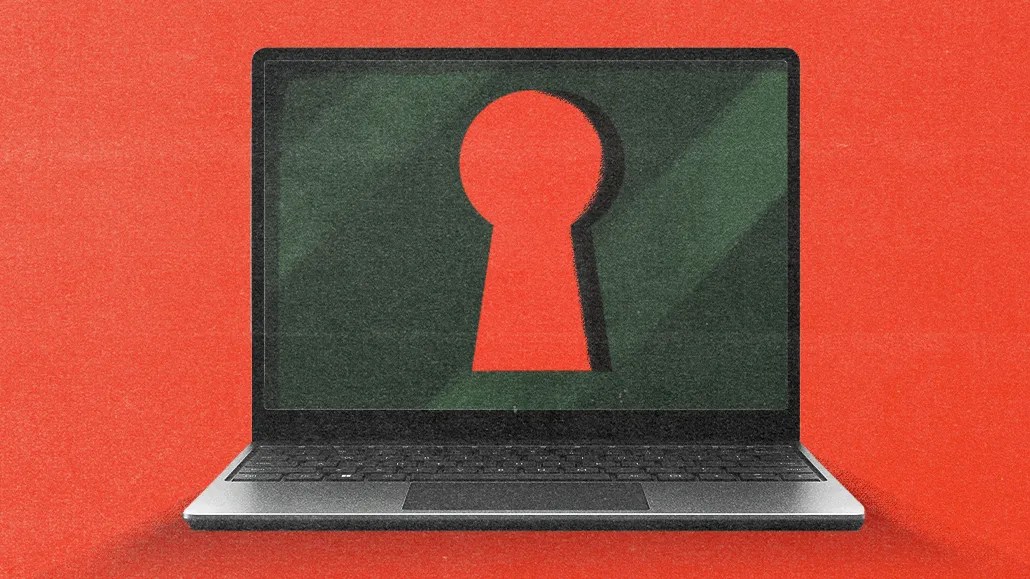 A laptop screen displaying a keyhole, symbolizing privacy and security, reflecting how personalization and privacy shape digital marketing strategies.